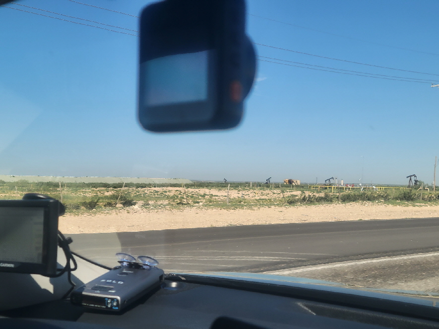 oil rigs everywhere, heading for Roswell New Mexico.