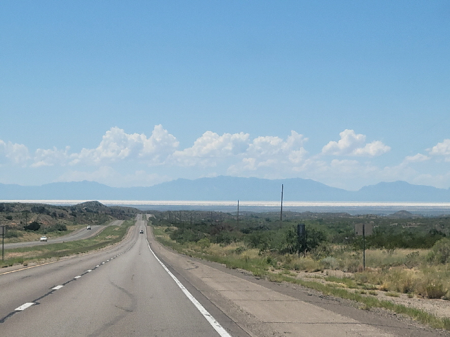 heading west in New Mexico; on the horizon is the White Sands of New Mexico